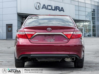 Finished in a Ruby Flare Pearl exterior that complements the Black leather/cloth interior, standing... (image 5)