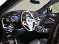 This 2020 BMW X6 M50i Coupe commands attention with aggressive styling, a powerful V8 engine, and re... (image 8)