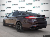 Explore the exceptional performance of the 2018 Ford Fusion in an eye-catching red with an AWD drive... (image 4)