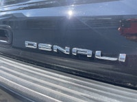 The 2023 GMC Yukon XL Denali is a full-size SUV that redefines luxury and capability, offering an ex... (image 6)