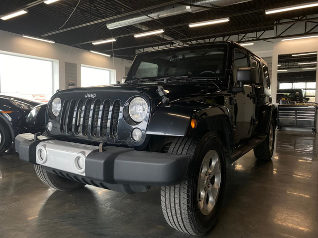 Jeep Wrangler Unlimited 4WD 4dr Sahara 2014 in Cars & Trucks in City of Montréal