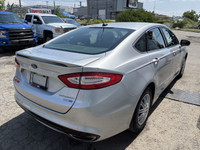 TITANIUM | AWD | LEATHER HEATED AND COOLED SEATS | SUNROOF This 2016 Ford Fusion Titanium offers a r... (image 3)