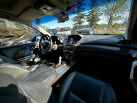 Stock#: 251245AThe 2010 Acura MDX Elite Package 4dr Canada is a luxurious and high-performance mid-s... (image 8)
