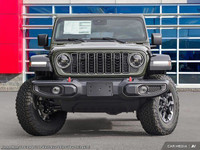 This Jeep Wrangler has a strong Regular Unleaded V-6 3.6 L/220 engine powering this Automatic transm... (image 1)