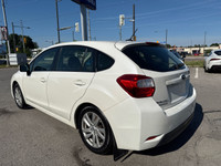 Do not miss out on this low mileage, locally owned and traded 2016 Manual Transmission Touring Impre... (image 5)