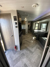 East to West Alta with bunkroom! This trailer features 2 slides, one in the main living area and ano... (image 5)