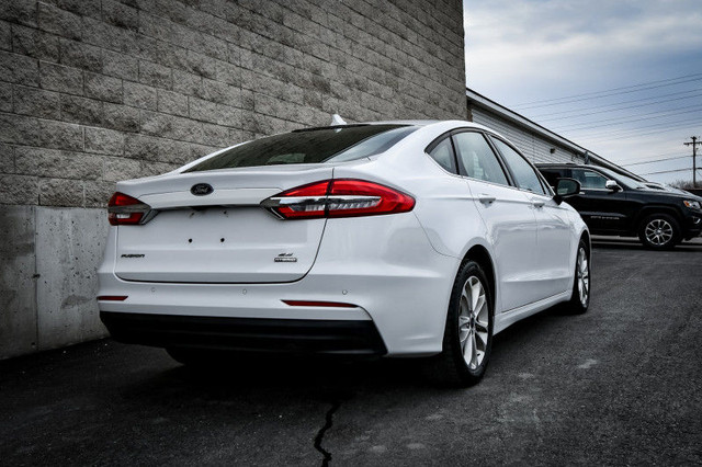 2020 Ford Fusion Hybrid SE • HEATED SEATS • PARK ASSIST • NAV in Cars & Trucks in Cornwall - Image 3