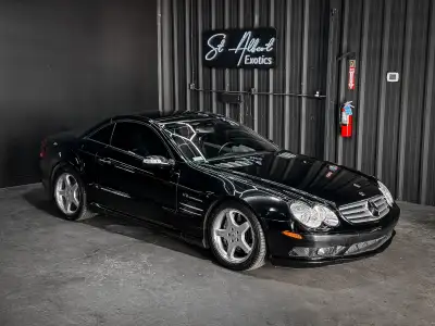 Presenting the 2005 Mercedes-Benz SL55 AMG sold by St Albert Exotics Panoramic vario-roof AMG-PERFOR...