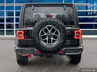 This Jeep Wrangler has a trusty Regular Unleaded V-6 3.6 L/220 engine powering this Manual transmiss... (image 5)