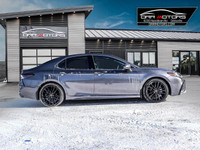 CAMRY XSE FEATURES AWD, 19-INCH WHEELS, AND DUAL EXHAUST. INSIDE, IT OFFERS A LEATHER-TRIMMED INTERI... (image 1)
