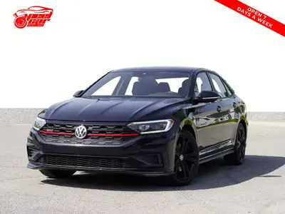 This 2021 Volkswagen Jetta GLI is a sleek sedan with a stylish black exterior and a sunroof for thos...