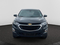 Offering excellent driving manners, this Chevrolet Equinox is Nightfall Grey Metallic in color and i... (image 7)