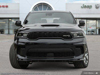 This Dodge Durango has a durable Intercooled Supercharger Premium Unleaded V-8 6.2 L/376 engine powe... (image 1)