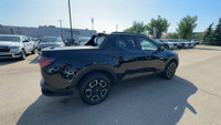 This Hyundai Santa Cruz is equipped with: Cloth Seat Trim, Heated front seats, Heated Steering Wheel... (image 8)
