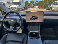 This Tesla Model 3 boasts a Electric engine powering this Automatic transmission. Window Grid Antenn... (image 9)