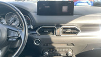 Le Mazda CX-5 Touring 2021 est un VUS compact qui allie style, performance et confort. Positionné da... (image 1)