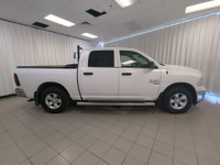 Drive our 2022 RAM 1500 Classic Tradesman Crew Cab 4X4 in Bright White and start taking care of busi... (image 8)