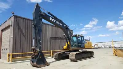 ENCLOSED CAB, AIR CONDITIONING AND HEATER, AUXILIARY HYDRAULICS PLUMBED TO THE END OF THE STICK, CAS...
