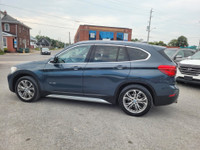 2016 BMW X1 AWD, Power locks, Power widows, Cruise control, AM, FM, CD, Bluetooth, Navigation, 4 Doo... (image 3)