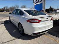 LOW MILEAGE FOR AGE!! TITANIUM MODEL!! LEATHER INTERIOR, ALL WHEEL DRIVE, BACKUP CAMERA, BLUETOOTH,... (image 3)