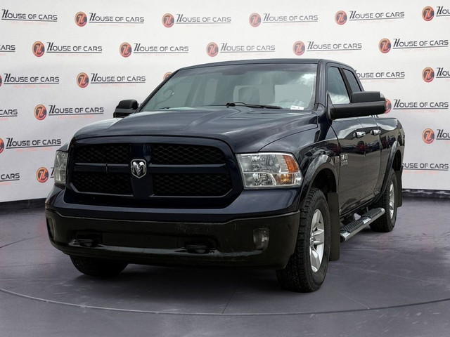 2014 Ram 1500 4WD Quad Cab 140.5 Outdoorsman in Cars & Trucks in Calgary