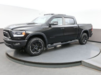 The 2021 Ram 1500 Rebel is a bold, off-road-focused full-size truck with a 5.7L HEMI V8 producing 39... (image 2)