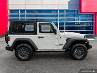 This Jeep Wrangler has a dependable Intercooled Turbo Premium Unleaded I-4 2.0 L/122 engine powering... (image 7)