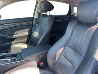 The 2018 Honda Accord Hybrid Touring is a midsize sedan that seamlessly blends efficiency, performan... (image 8)