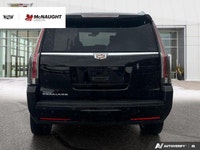 The 2019 Cadillac Escalade includes four-wheel drive, an adaptive air suspension, and power retracta... (image 3)