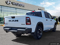 Command the road in this 2024 Ram 1500 Rebel Crew Cab, a head-turning powerhouse boasting a robust 5... (image 4)
