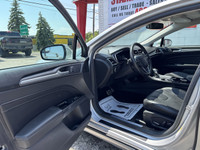 TITANIUM | AWD | LEATHER HEATED AND COOLED SEATS | SUNROOF This 2016 Ford Fusion Titanium offers a r... (image 9)