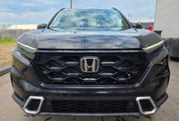 The 2026 Honda CR-V Hybrid Touring is the ultimate blend of modern efficiency and premium comfort. I... (image 1)