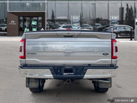 Command the road with this impressive 2021 Ford F-150 King Ranch Crew Cab. This robust 4x4 boasts a... (image 4)