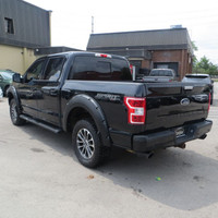 Check out this sleek 2018 Ford F-150 with a powerful 5.0L V8 engine and a 4X4 drive! With a stylish... (image 6)