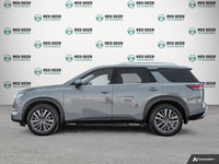 Introducing the 2023 Nissan Pathfinder SL, a stylish gray 4WD SUV that brings confidence to every dr... (image 3)