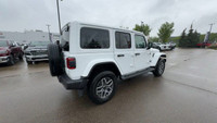 This 2025 JEEP WRANGLER 4-DOOR SAHARA has the following options Cloth Low-Back Bucket Seats, Remote... (image 1)