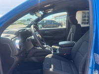 The 2023 Chevrolet Colorado 4WD LT Crew Cab in a striking blue finish offers impeccable handling wit... (image 6)