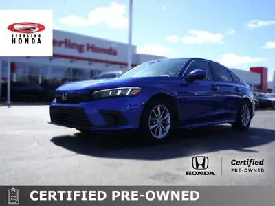 Turn heads in this Aegean Blue Metallic 2022 Honda Civic Sedan EX. Boasting a low 54,467 km, this Ce...