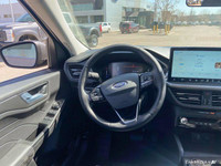 This Ford Escape has a durable Gas/Electric I-4 2.5 L/152 engine powering this Variable transmission... (image 8)