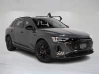 This 2024 Audi Q8 e-tron blends all-electric power with refined luxury, finished in a sleek dark gre... (image 1)
