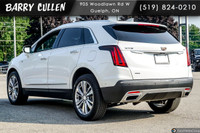 The 2024 Cadillac XT5 AWD Premium Luxury stands out in its stunning white exterior, delivering excel... (image 5)