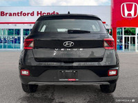 This 2022 Hyundai Venue Trend SUV boasts a sleek Space Black exterior and a practical, comfortable b... (image 4)