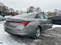The 2023 Hyundai Elantra is a modern and stylish compact sedan that stands out with its bold design... (image 9)