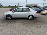 TIGER AUTO SALES LTD - Quality Pre-Owned Car Dealership - Located at 2275 Dundas St., London, Ontari... (image 1)