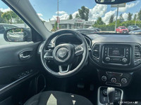 KBB.com 10 Best All-Wheel-Drive Vehicles Under $25,000. This Jeep Compass delivers a Regular Unleade... (image 8)