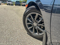 Stock: P11696 Power-adjustable driver's seat, cloth upholstery, one-touch power moonroof, 7-inch tou... (image 9)