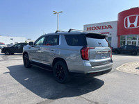 Command the road with this 2023 GMC Yukon SLT, a powerful and versatile SUV that effortlessly blends... (image 6)