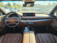 Experience the impressive 2023 Genesis G80 2.5T Advanced, a stunning white all-wheel-drive sedan tha... (image 6)