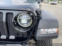The 2021 Jeep Wrangler Unlimited Willys 4x4 is a rugged and capable off-roading icon, ready for adve... (image 7)