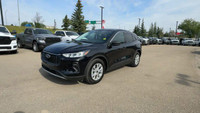 This Ford Escape is equipped with: Cloth Seats Trim, Radio: AM/FM Stereo w/SiriusXM, 8 Inch Touchscr... (image 4)
